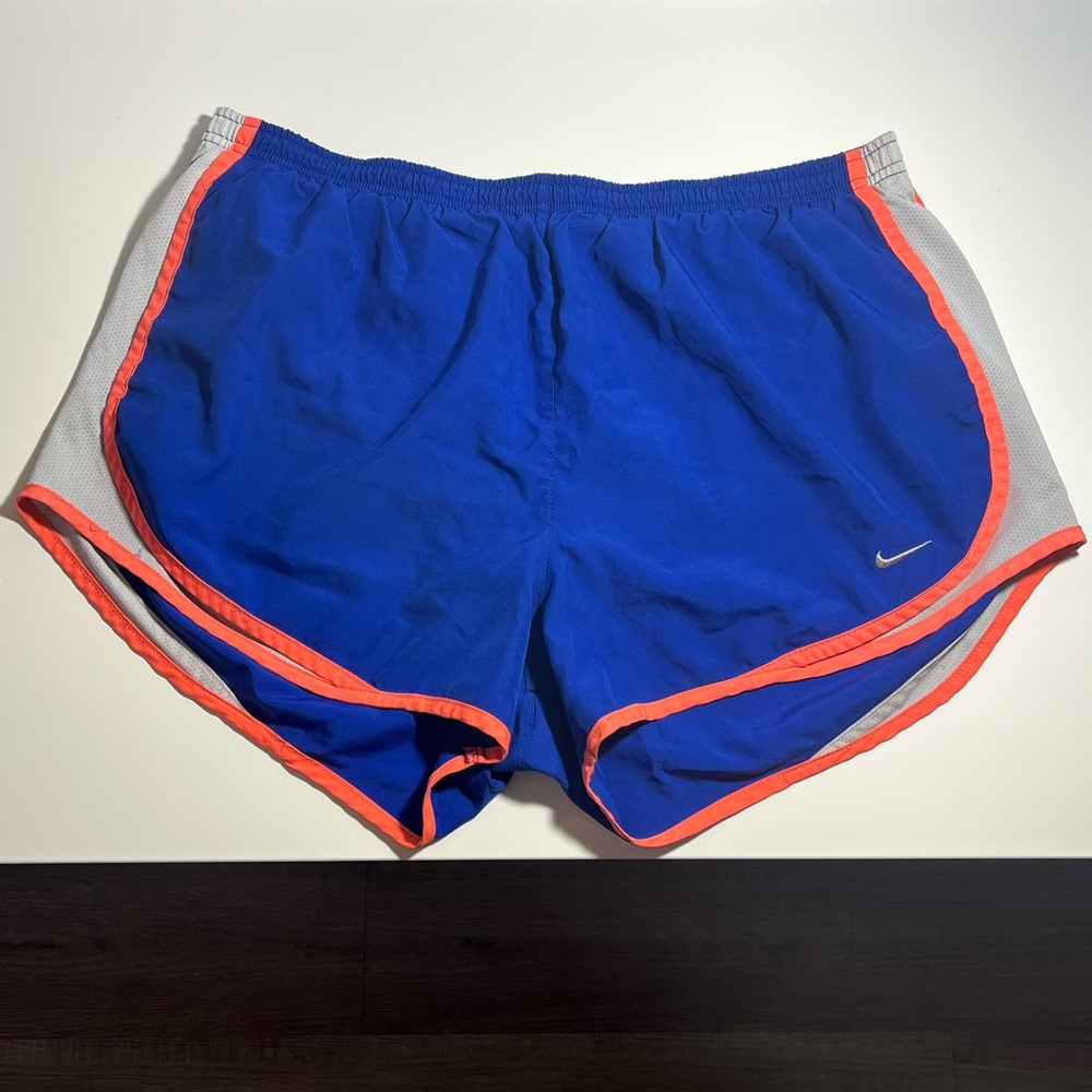 Nike Blue and Orange Athletic Shorts with Curved Hem
